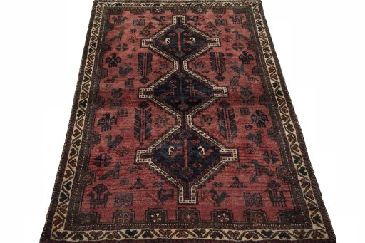 Surface texture of 2000s Shiraz rug with natural Wool and intricate pattern