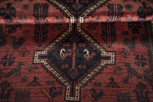 Full view of 2000s Shiraz rug from Iran / Persia, 152 × 105 cm in Red tones