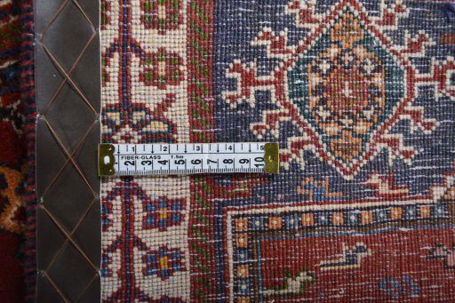 Central medallion detail of 2000s Shiraz rug from Iran / Persia