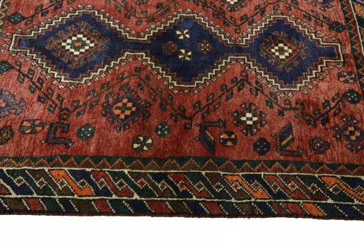 Close-up detail of 2000s Shiraz rug from Iran / Persia showing Wool weave