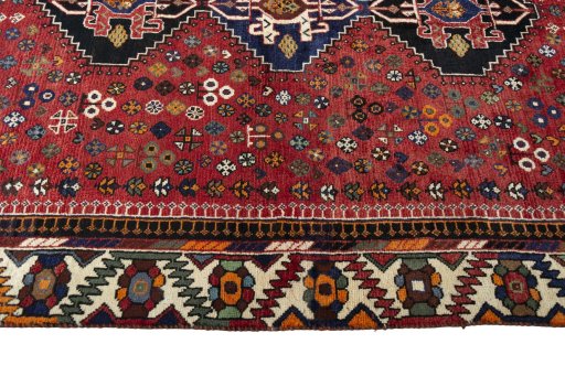 Close-up detail of 2000s Shiraz rug from Iran / Persia showing Wool weave