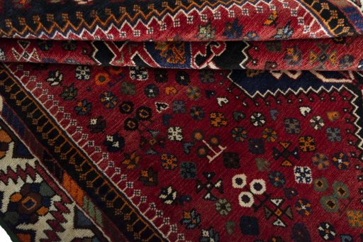 Full view of 2000s Shiraz rug from Iran / Persia, 255 × 165 cm in Red tones