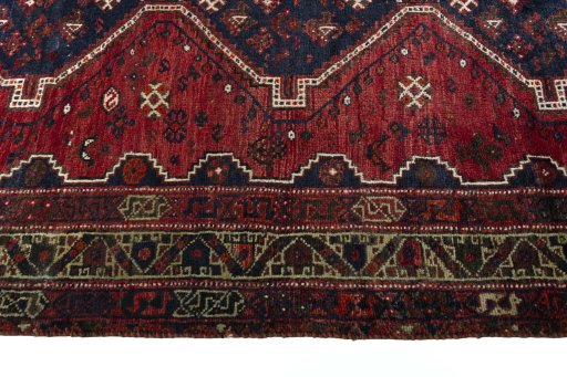 Close-up detail of 2000s Shiraz rug from Iran / Persia showing Wool weave