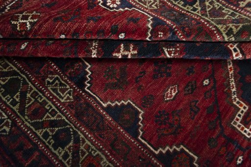 Full view of 2000s Shiraz rug from Iran / Persia, 260 × 172 cm in Red tones