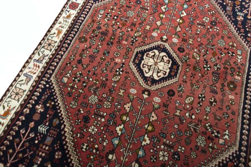 Backside of handmade 2000s Shiraz rug showing knot structure and weave density