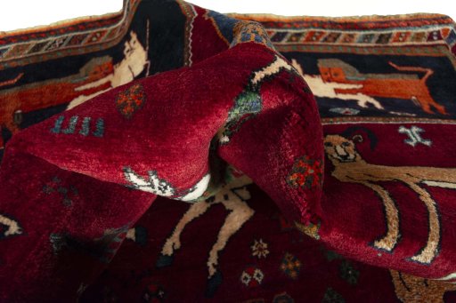 Corner detail of 2000s Shiraz rug showing border pattern and Wool pile