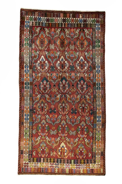 Full view of 2000s Shiraz rug from Iran / Persia, 300 × 160 cm in Red tones