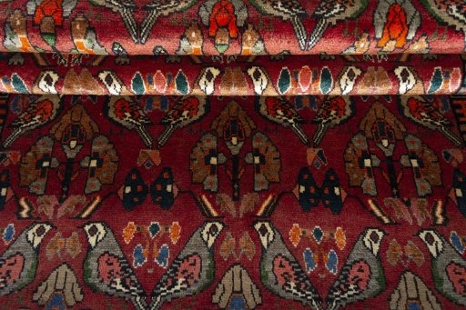 Full view of 2000s Shiraz rug from Iran / Persia, 300 × 160 cm in Red tones