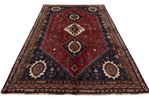 Surface texture of 2000s Shiraz rug with natural Wool and intricate pattern