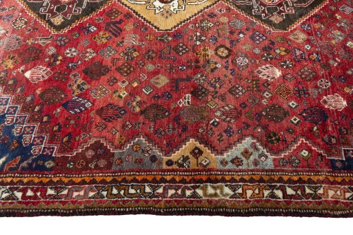 Full view of 2000s Shiraz rug from Iran / Persia, 273 × 185 cm in Red tones