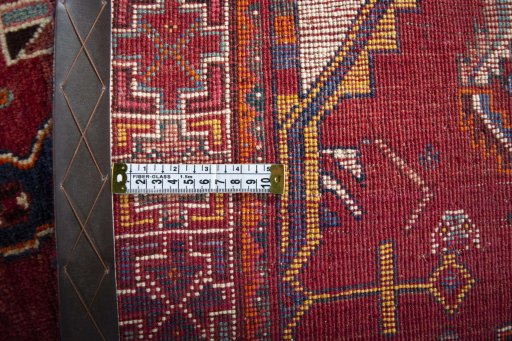 Backside of handmade 2000s Shiraz rug showing knot structure and weave density