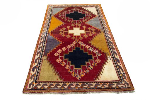 Surface texture of 2000s Shiraz rug with natural Wool and intricate pattern