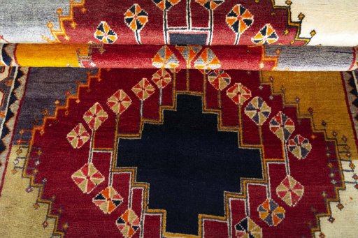 Full view of 2000s Shiraz rug from Iran / Persia, 216 × 125 cm in Red tones