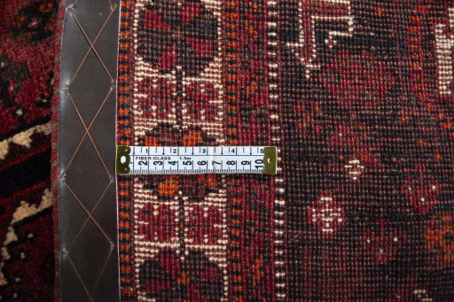 Close-up detail of 2000s Shiraz rug from Iran / Persia showing Wool weave