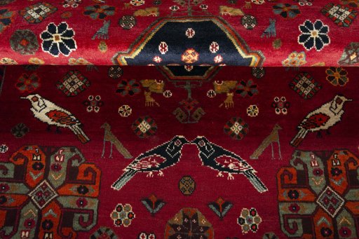 Corner detail of 2000s Shiraz rug showing border pattern and Wool pile