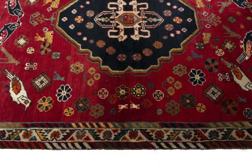 Full view of 2000s Shiraz rug from Iran / Persia, 185 × 125 cm in Red tones