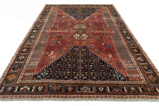 Surface texture of 2000s Shiraz rug with natural Wool and intricate pattern
