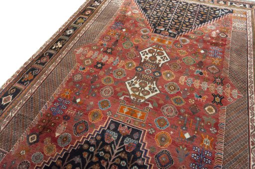 Backside of handmade 2000s Shiraz rug showing knot structure and weave density