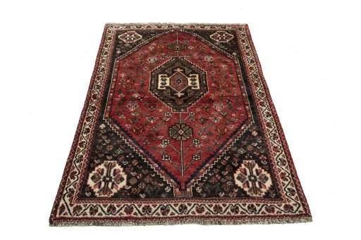 Surface texture of 2000s Shiraz rug with natural Wool and intricate pattern