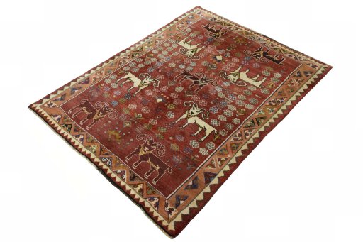 Corner detail of 2000s Shiraz rug showing border pattern and Wool pile