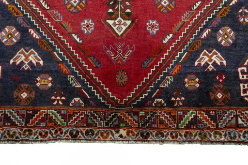 Full view of 2000s Shiraz rug from Iran / Persia, 284 × 173 cm in Red tones