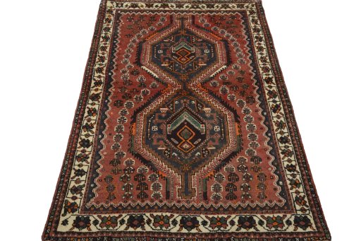 Surface texture of 2000s Shiraz rug with natural Wool and intricate pattern