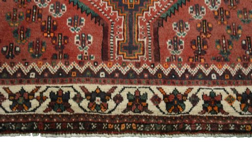 Central medallion detail of 2000s Shiraz rug from Iran / Persia