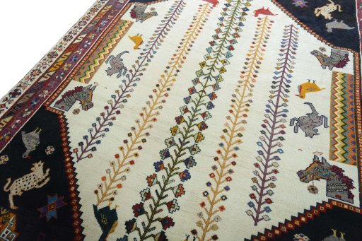 Backside of handmade 2000s Shiraz rug showing knot structure and weave density