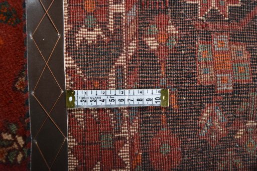 Close-up detail of 1970s Shiraz rug from Iran / Persia showing Wool weave