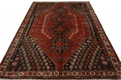 Surface texture of 1970s Shiraz rug with natural Wool and intricate pattern