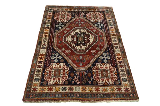 Surface texture of 2000s Shiraz rug with natural Cotton and intricate pattern