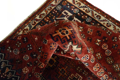 Close-up detail of 2000s Shiraz rug from Iran / Persia showing Wool weave