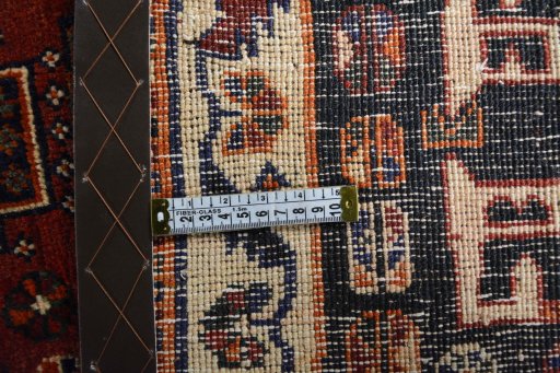 Surface texture of 2000s Shiraz rug with natural Wool and intricate pattern