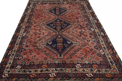 Surface texture of 2000s Shiraz rug with natural Wool and intricate pattern