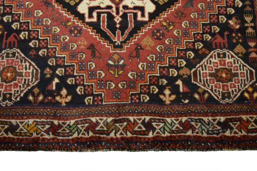 Central medallion detail of 2000s Shiraz rug from Iran / Persia
