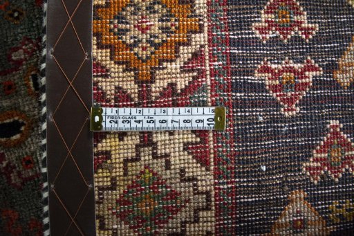Close-up detail of 2000s Shiraz rug from Iran / Persia showing Wool weave