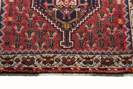 Central medallion detail of 2000s Shiraz rug from Iran / Persia