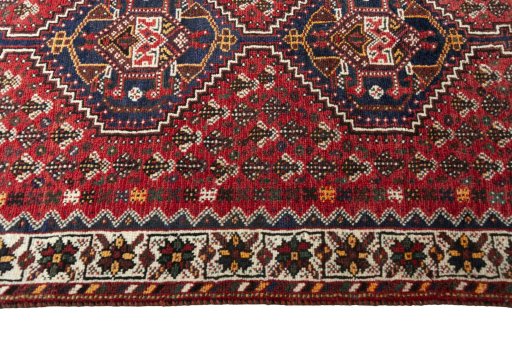 Close-up detail of 2000s Shiraz rug from Iran / Persia showing Wool weave