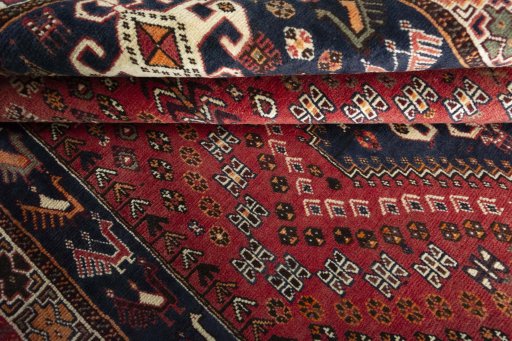 Close-up detail of 2000s Shiraz rug from Iran / Persia showing Wool weave