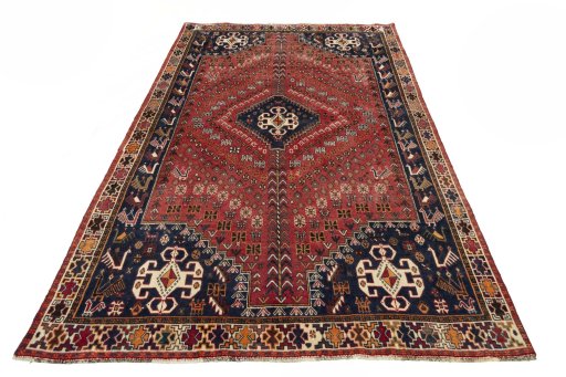 Surface texture of 2000s Shiraz rug with natural Wool and intricate pattern