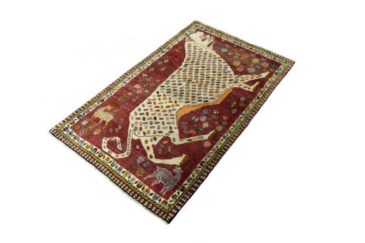Corner detail of 2000s Shiraz rug showing border pattern and Wool pile
