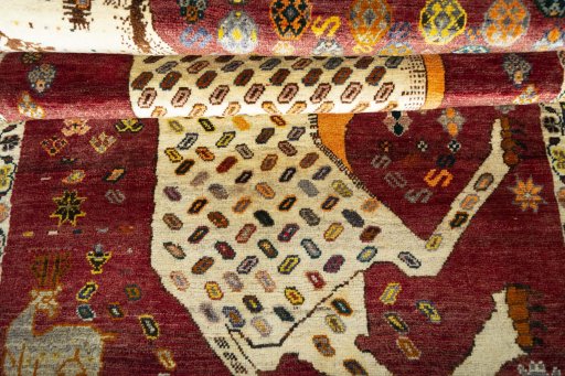 Full view of 2000s Shiraz rug from Iran / Persia, 191 × 112 cm in Red tones