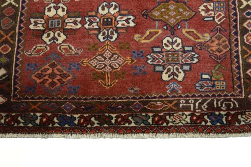 Central medallion detail of 2000s Shiraz rug from Iran / Persia