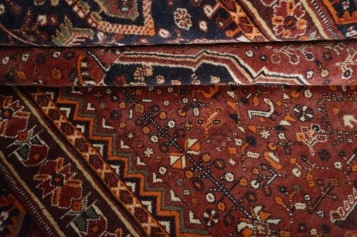 Close-up detail of 2000s Shiraz rug from Iran / Persia showing Wool weave