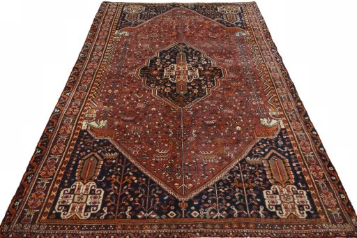 Surface texture of 2000s Shiraz rug with natural Wool and intricate pattern