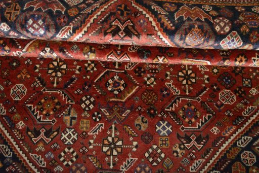 Close-up detail of 2000s Shiraz rug from Iran / Persia showing Wool weave