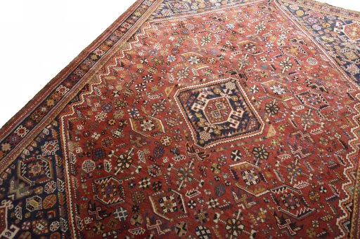 Backside of handmade 2000s Shiraz rug showing knot structure and weave density