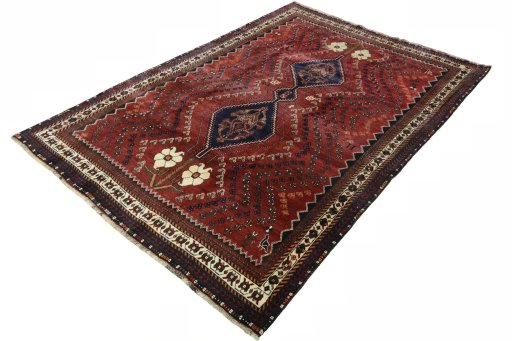 Corner detail of 2000s Shiraz rug showing border pattern and Wool pile