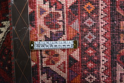 Close-up detail of 2000s Shiraz rug from Iran / Persia showing Wool weave