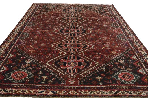 Surface texture of 2000s Shiraz rug with natural Wool and intricate pattern